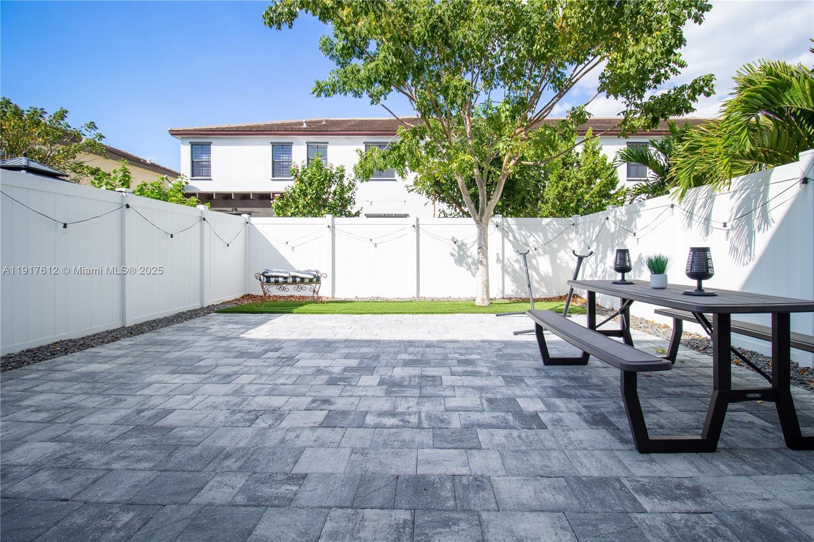 3435 West 105th Street Hialeah, FL 33018 - Photo 15 of 41 a view of an house with backyard and sitting area