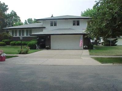 3332 Wirth Road Highland, IN 46322 - Photo 1 of 1 a front view of a house with a yard and garage