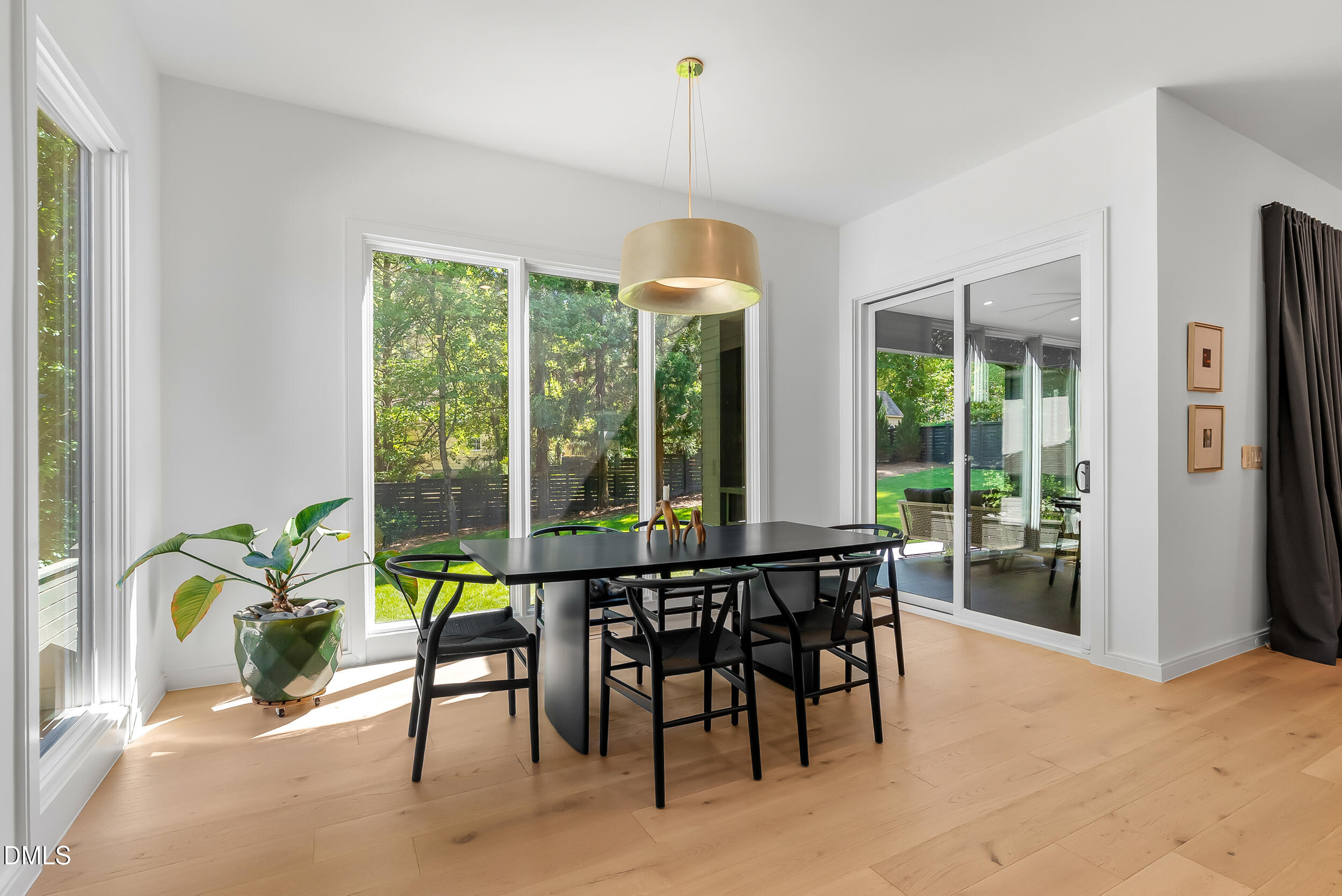 2105 Manuel Street Raleigh, NC 27612 - Photo 22 of 63 a view of a dining room with furniture window and outside view