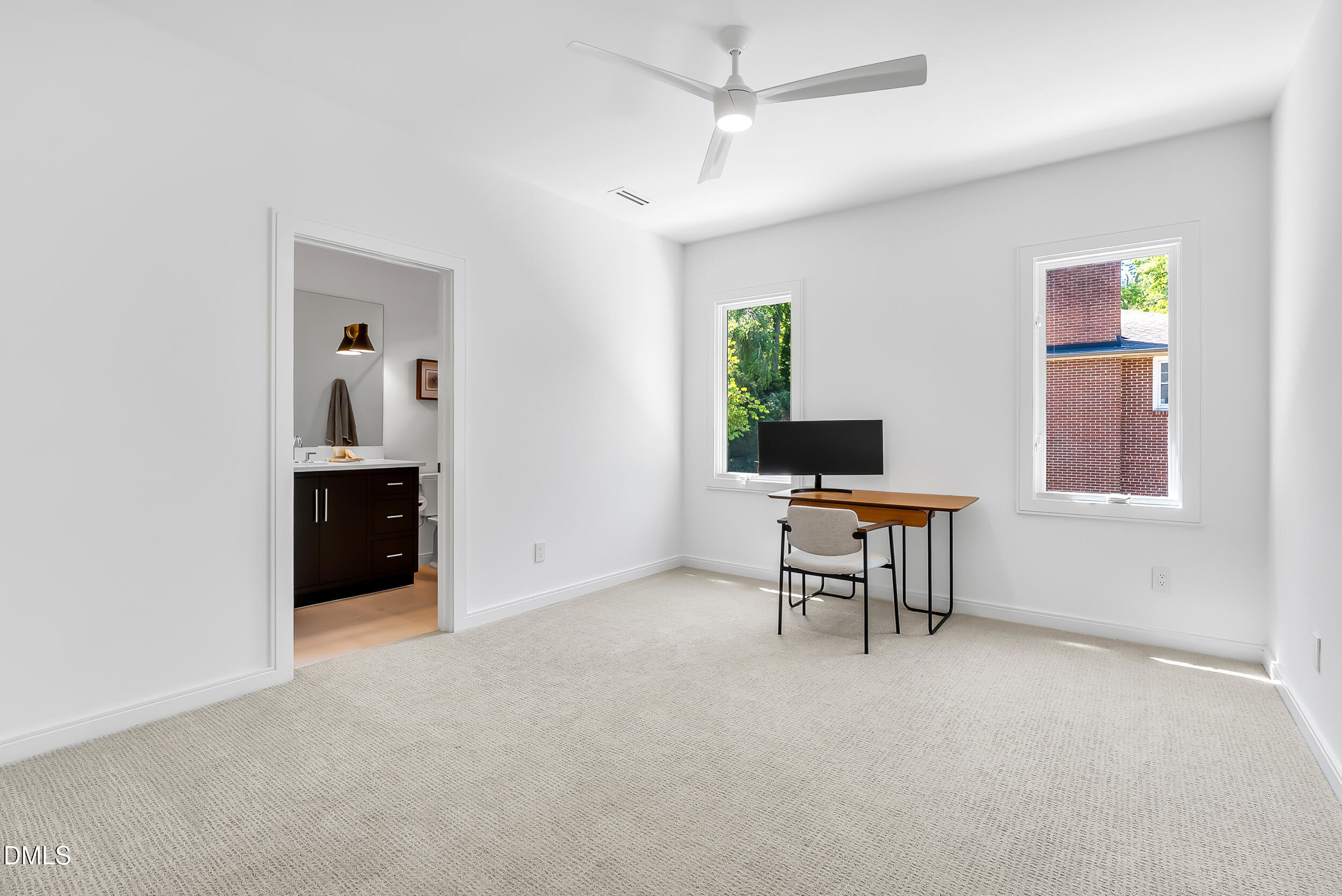 2105 Manuel Street Raleigh, NC 27612 - Photo 42 of 63 a workspace with furniture and window