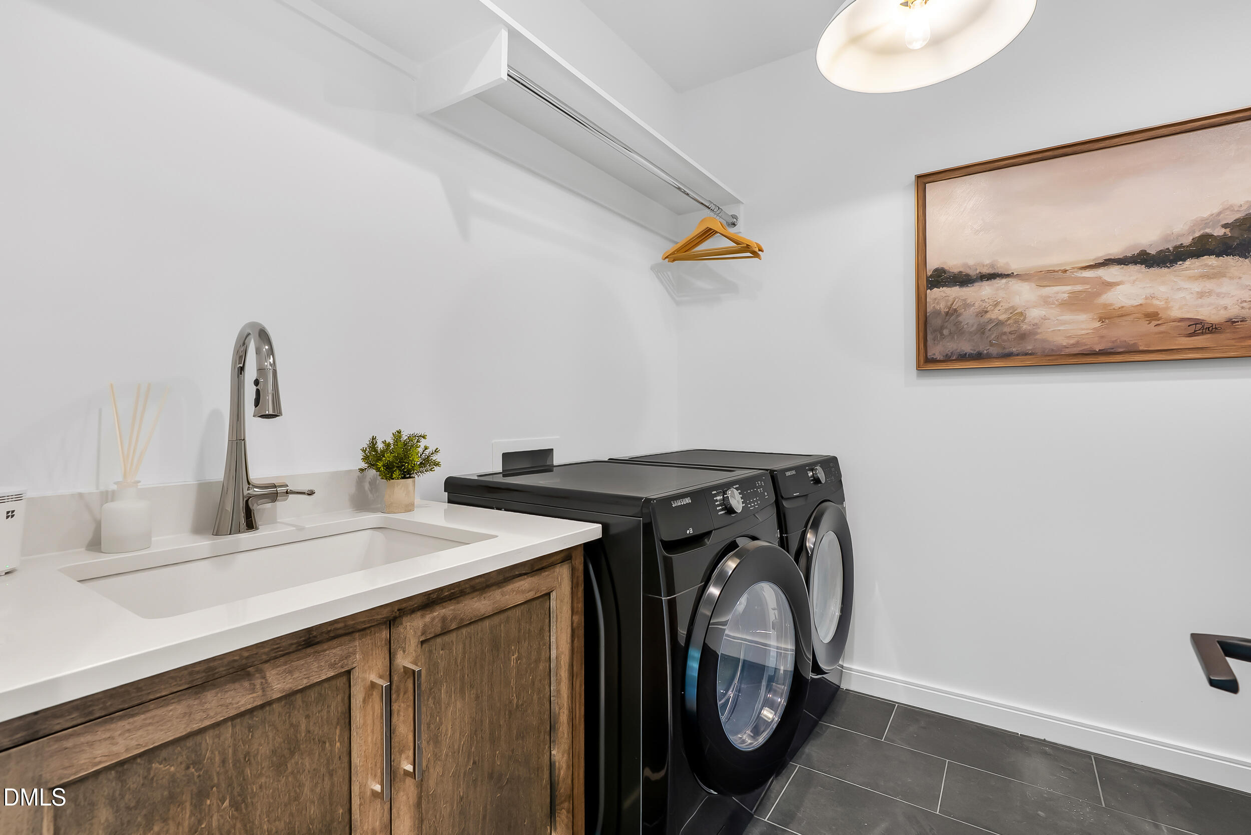 2105 Manuel Street Raleigh, NC 27612 - Photo 47 of 63 a utility room with dryer and washer