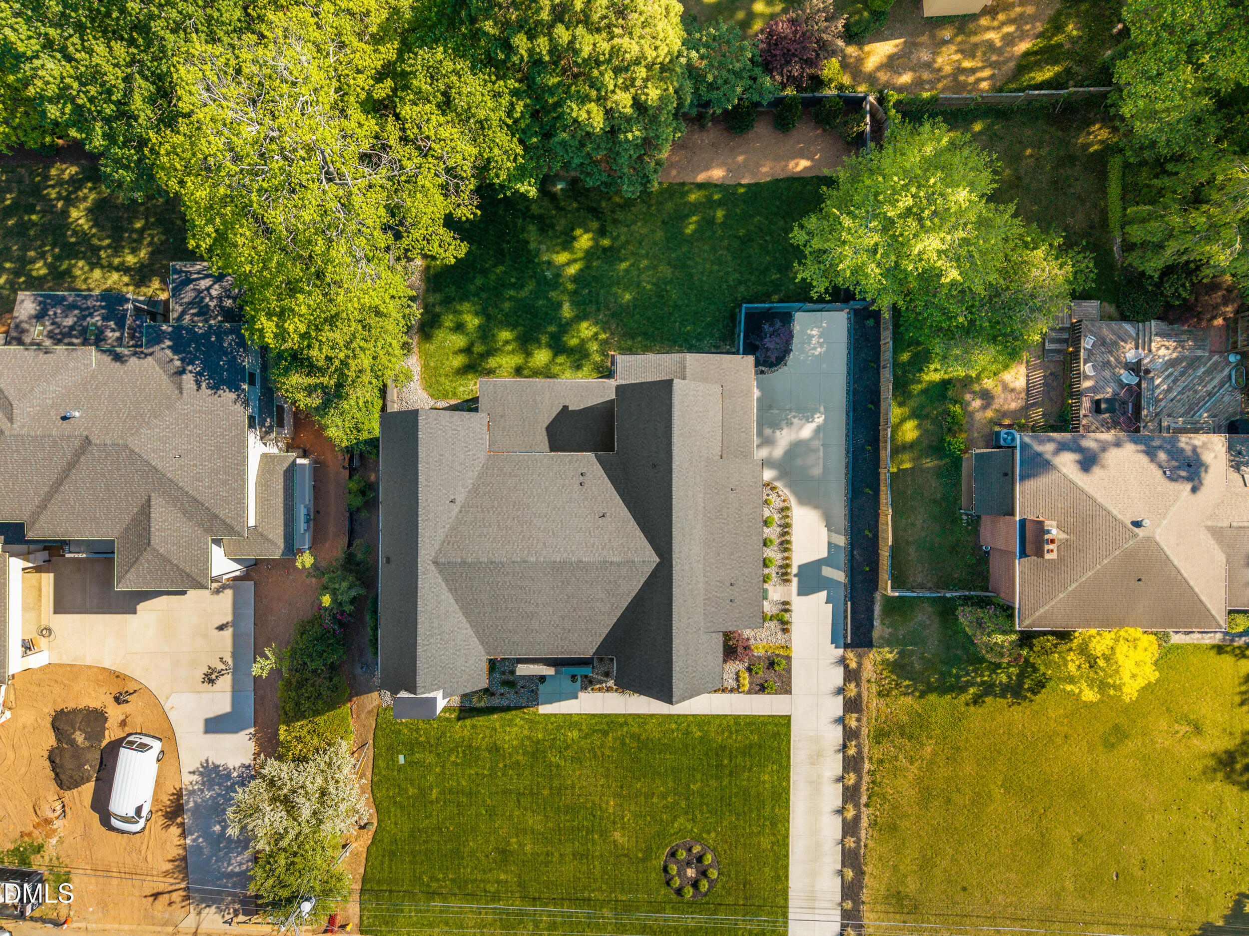 2105 Manuel Street Raleigh, NC 27612 - Photo 60 of 63 an aerial view of residential houses with outdoor space and trees