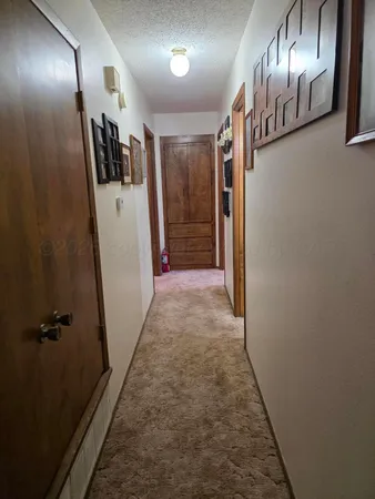 a view of hallway with stairs