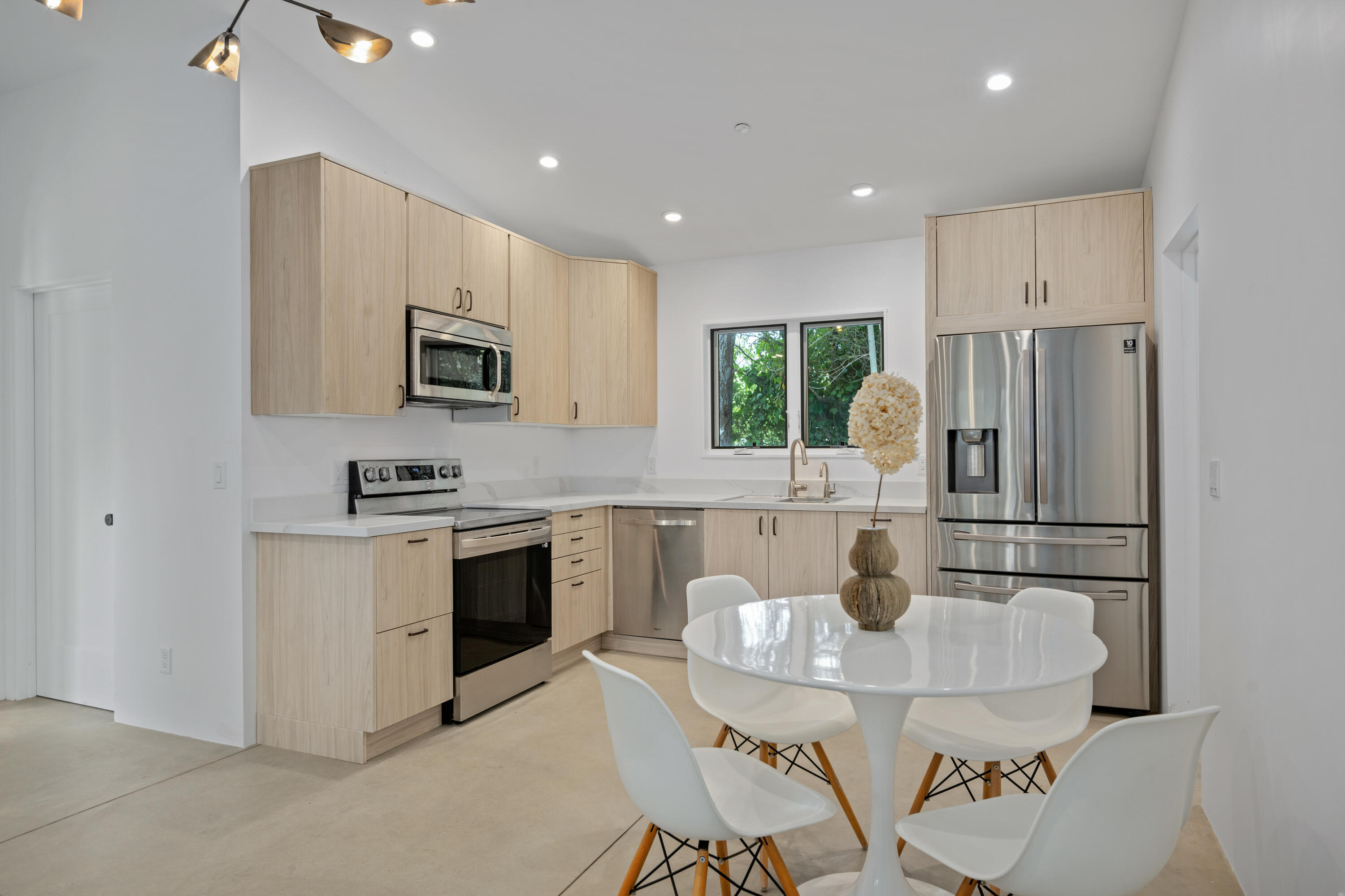 1374 1/2 East Valley Road Montecito, CA 93108 - Photo 4 of 12 a kitchen with stainless steel appliances granite countertop a refrigerator stove microwave and sink