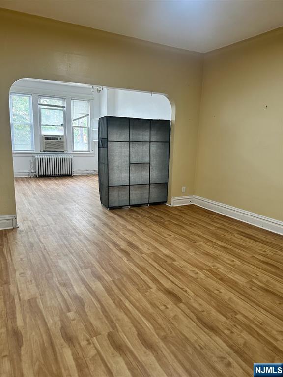 141 67th Street, Unit 2 West New York, NJ 07093 - Photo 1 of 12 an empty room with windows