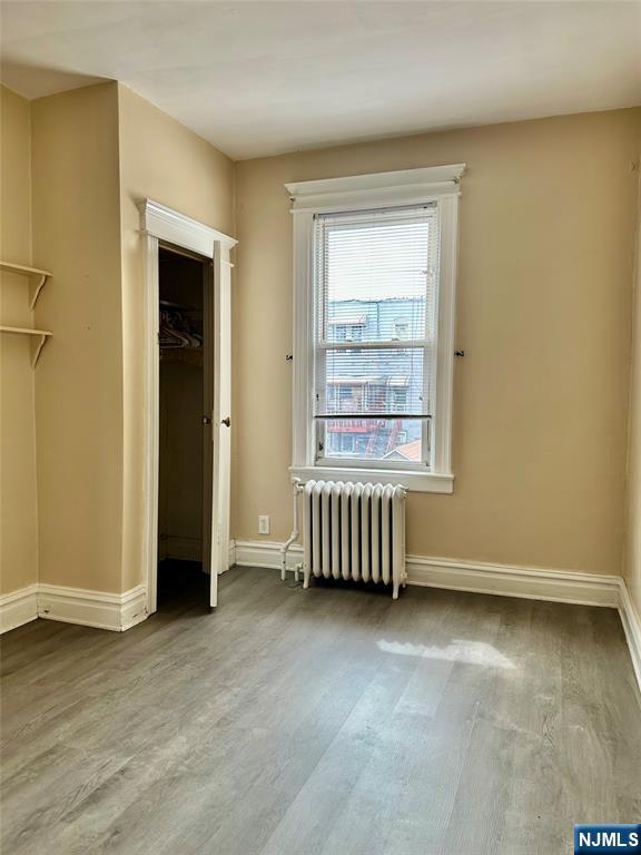 141 67th Street, Unit 2 West New York, NJ 07093 - Photo 4 of 12 an empty room with a window