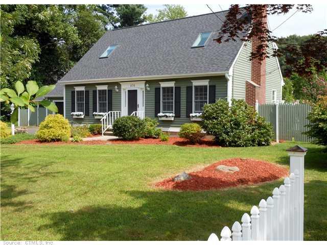 876 Laurel Grove Road Middletown, CT 06457 - Photo 1 of 1 a front view of a house with a garden and porch