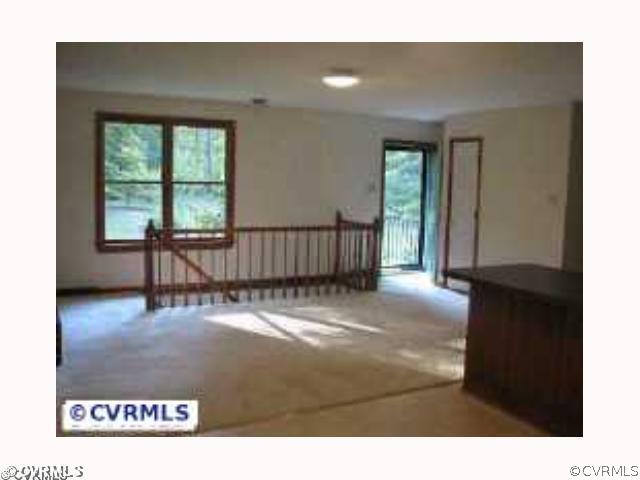 4828 Bradshaw Road Gum Spring, VA 23065 - Photo 3 of 10 a view of an empty room and window