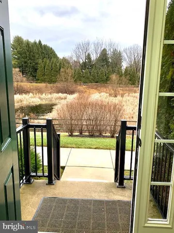 a view of balcony with furniture