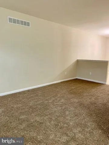 a view of balcony with furniture