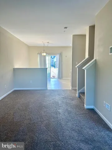 a view of a yard with an ocean view