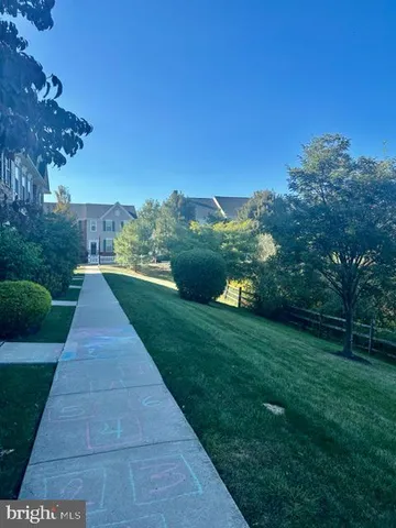 a view of a lake with a yard