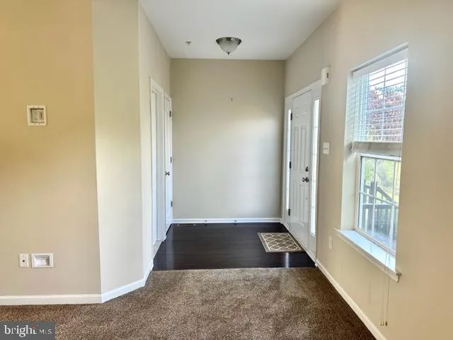 a view of an empty room with window