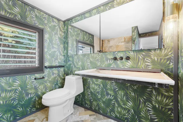 a bathroom with a bathtub and shower