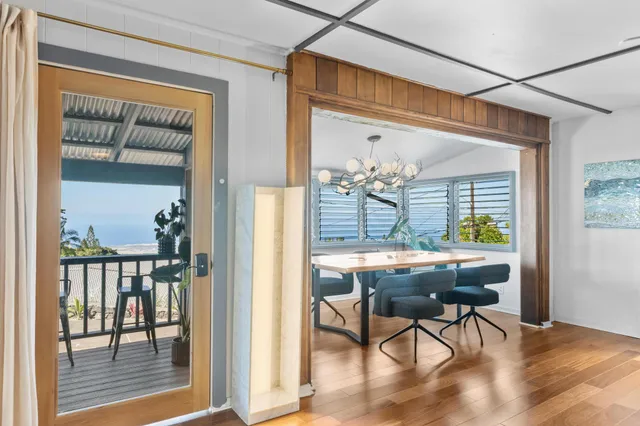 a workspace with furniture and window