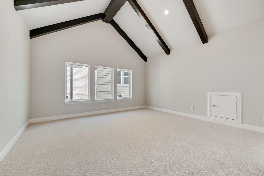 1231 Calebria Way Fate, TX 75087 - Photo 29 of 40 an empty room with windows