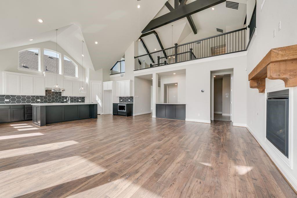 1231 Calebria Way Fate, TX 75087 - Photo 9 of 40 a view of kitchen and natural light