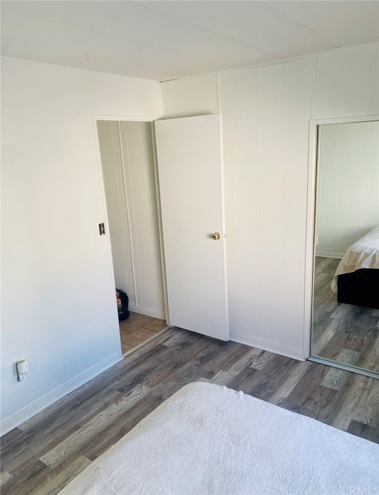 1782 Nisson Road, Unit 17 Tustin, CA 92780 - Photo 4 of 6 a view of a room with wooden floor