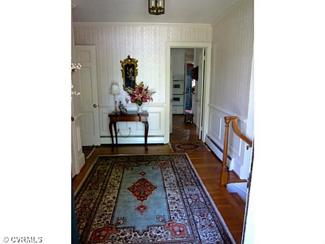 509 Ridge Top Road Henrico, VA 23229 - Photo 6 of 11 Foyer - Hardwood floors, coat closet and moldings.