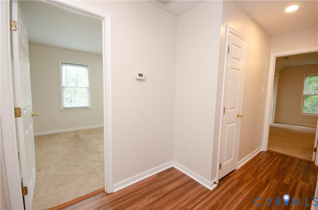10912 Point Grey Road Henrico, VA 23233 - Photo 22 of 36 Wood-finish flooring, neutral wall paint, white tr
