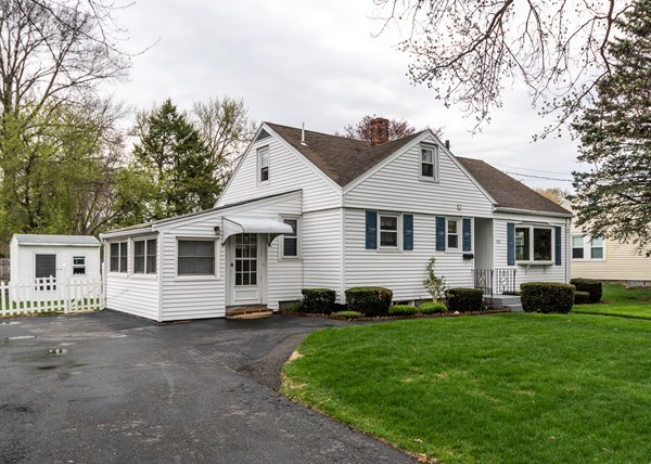1131 Trapelo Road Waltham, MA 02451 - Photo 1 of 23 a front view of a house with a yard