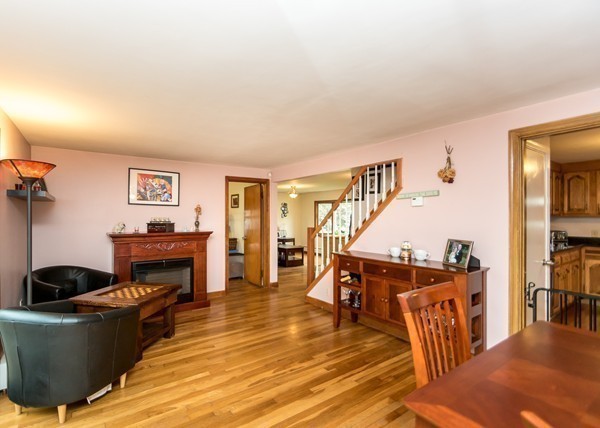 1131 Trapelo Road Waltham, MA 02451 - Photo 15 of 23 a living room with furniture and a wooden floor