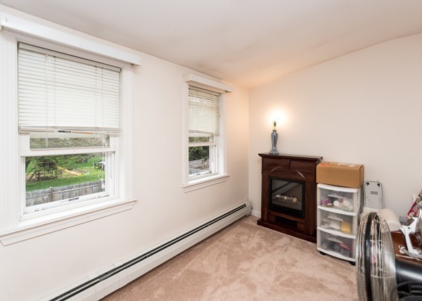 1131 Trapelo Road Waltham, MA 02451 - Photo 21 of 23 a view of livingroom with furniture and a window