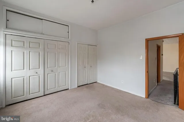 a front view of a house with a outdoor space