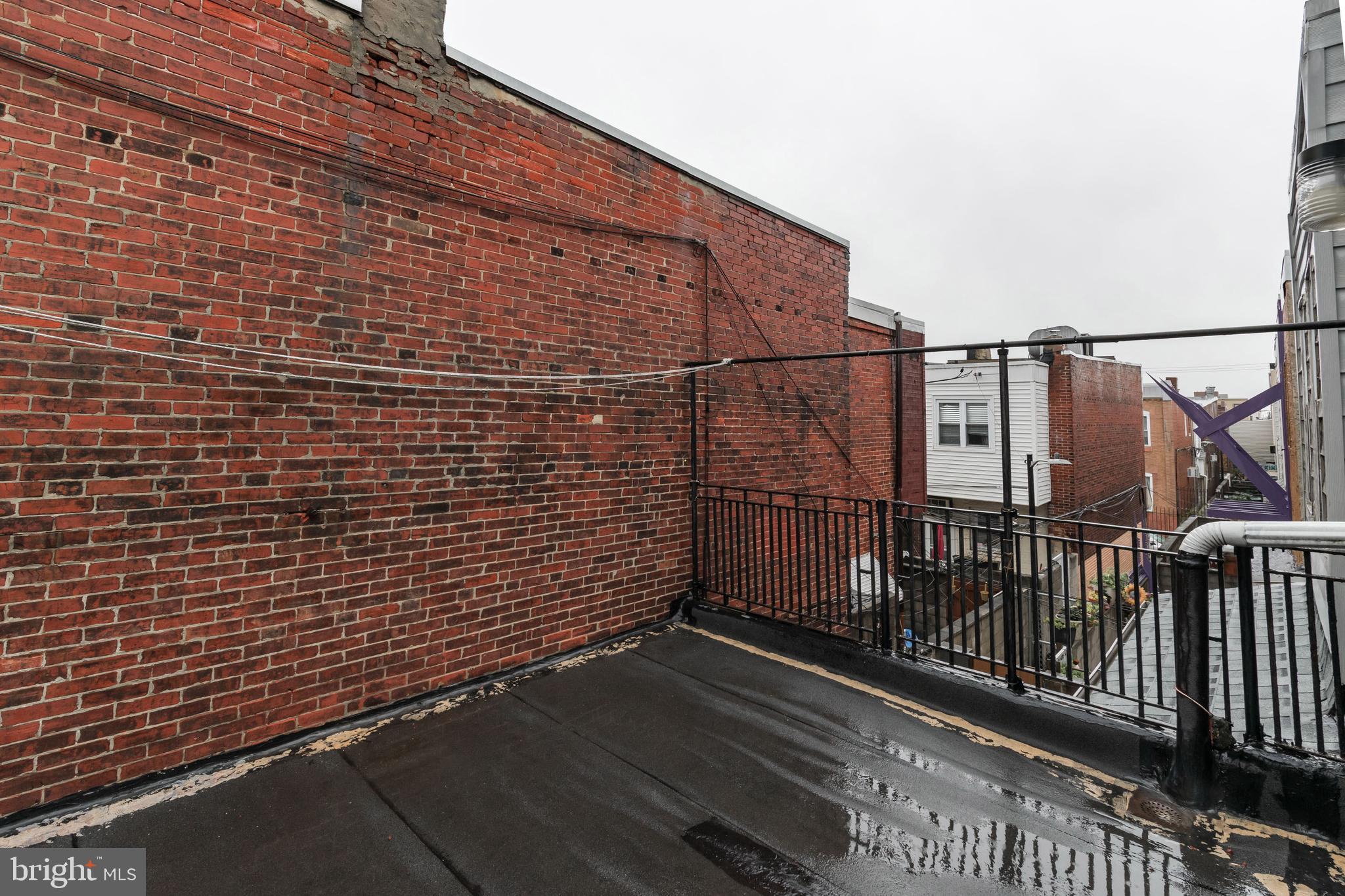 1325 West Porter Street Philadelphia, PA 19148 - Photo 8 of 17 a view of a balcony with wooden floor