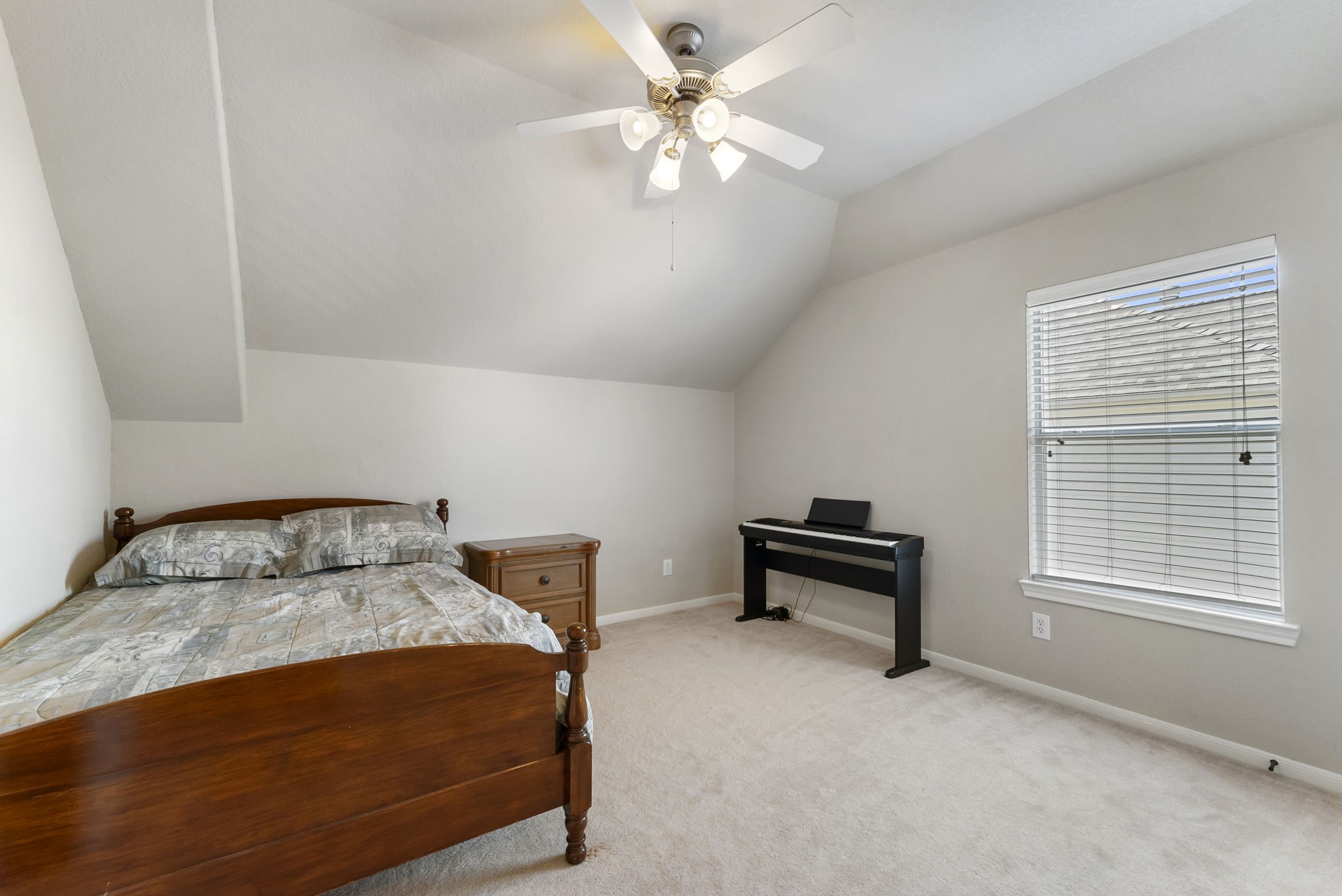 19223 Senterra Lakes Boulevard Spring, TX 77379 - Photo 31 of 48 a bedroom with a bed and a window