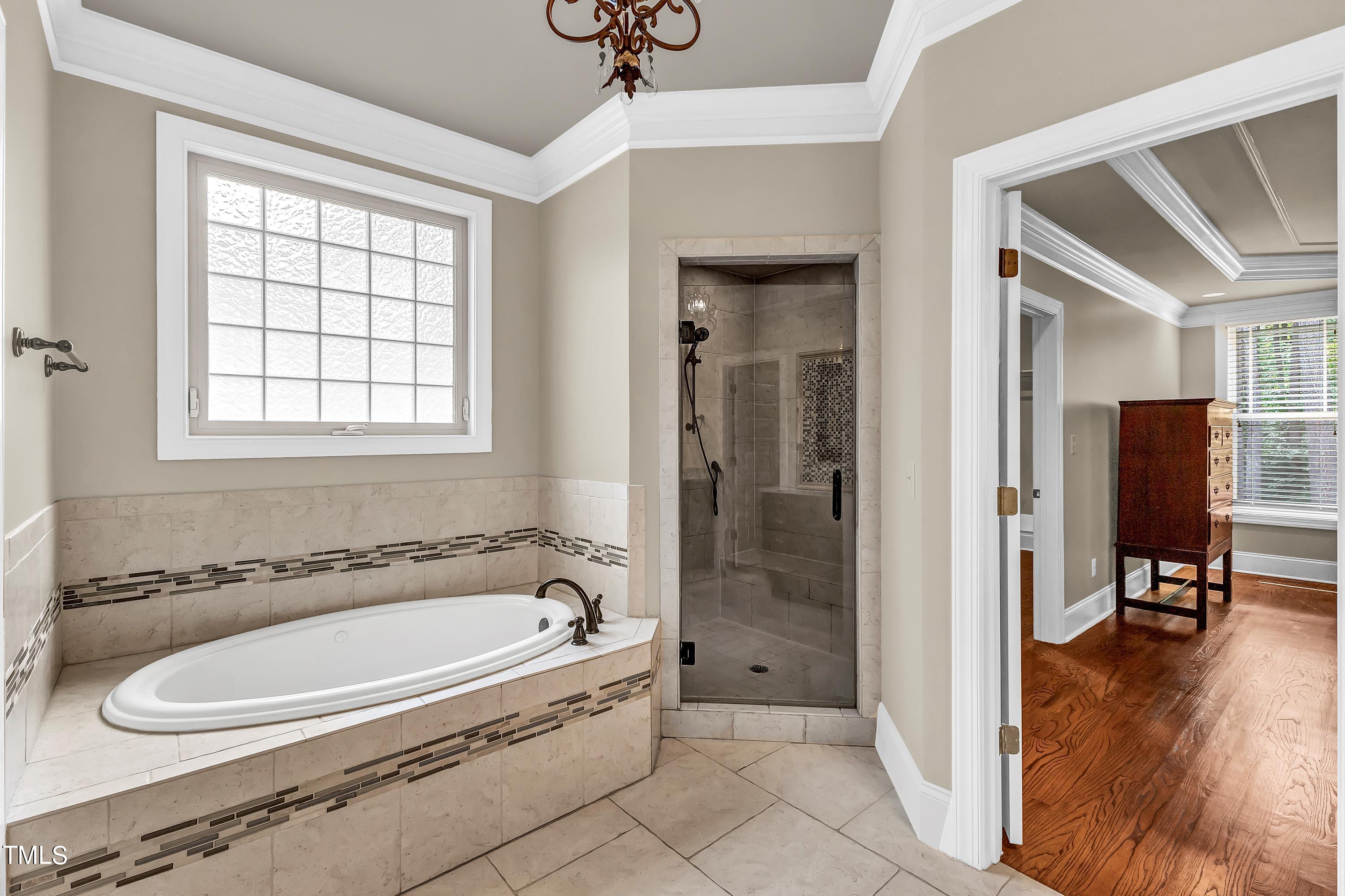 6125 Purnell Road Wake Forest, NC 27587 - Photo 24 of 39 Primary Shower and Whirlpool Tub