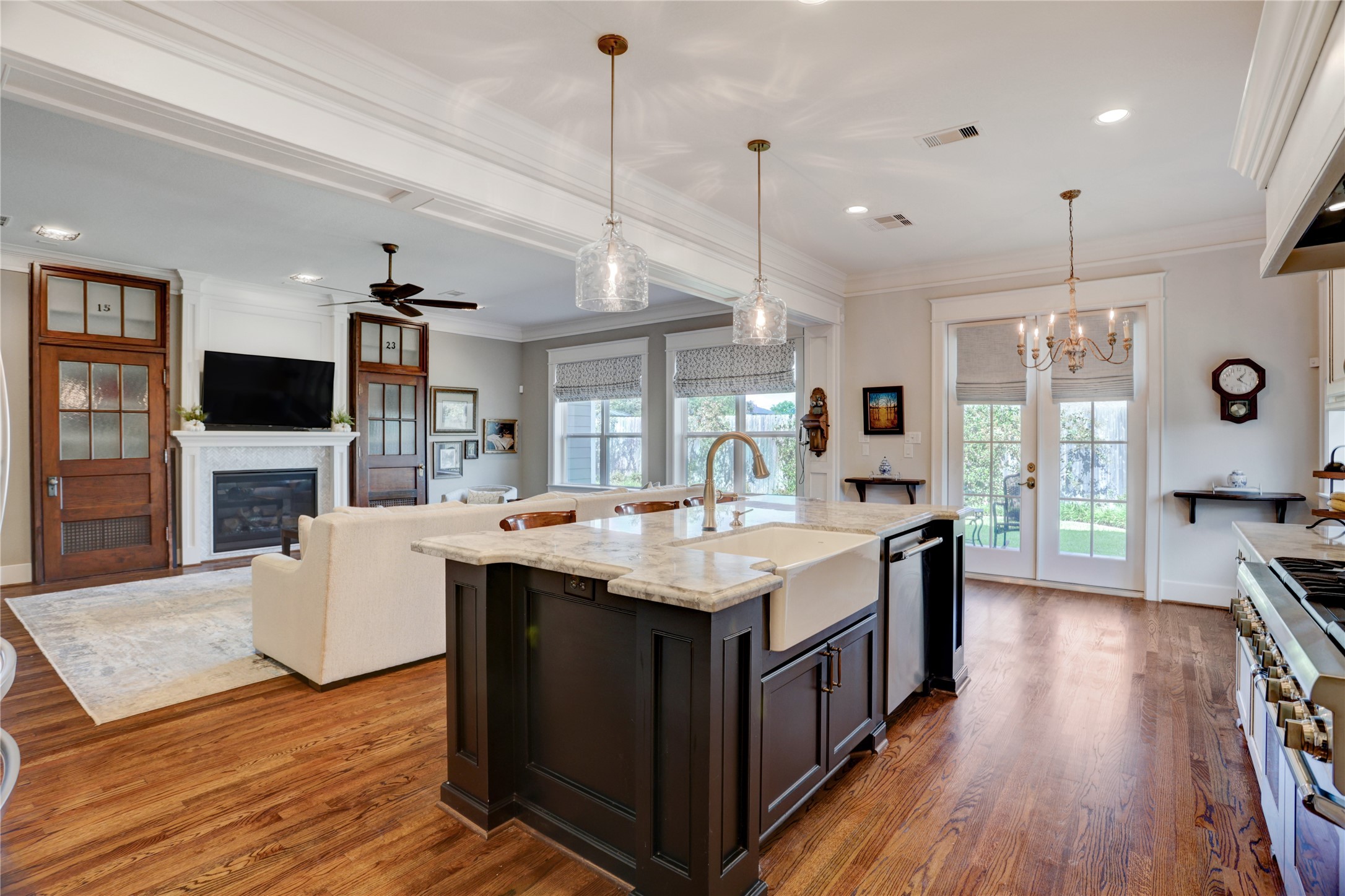 6430 Rolla Street Houston, TX 77055 - Photo 14 of 30 a kitchen with a stove and a wooden floor