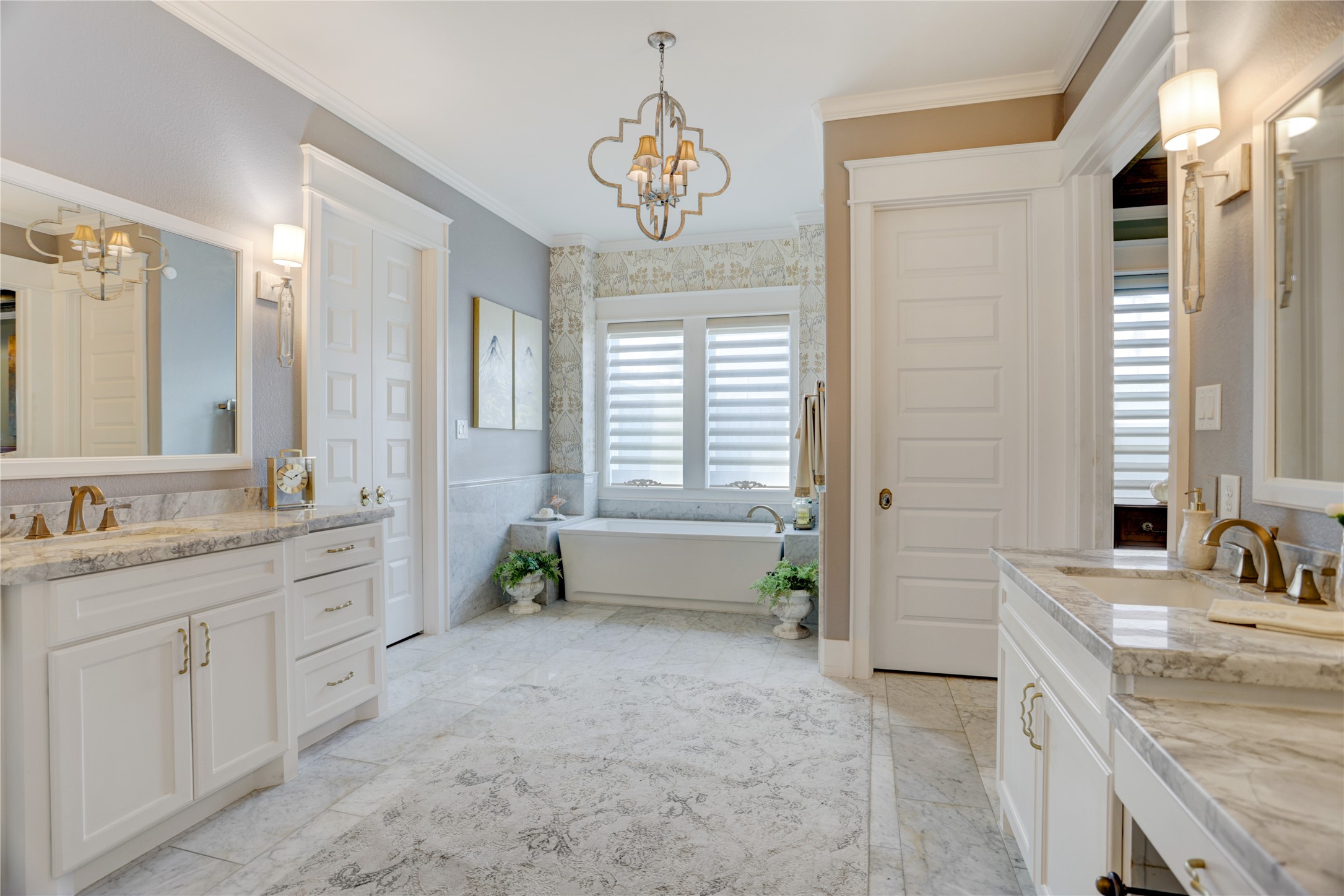6430 Rolla Street Houston, TX 77055 - Photo 19 of 30 a spacious bathroom with a granite countertop tub sink and mirror