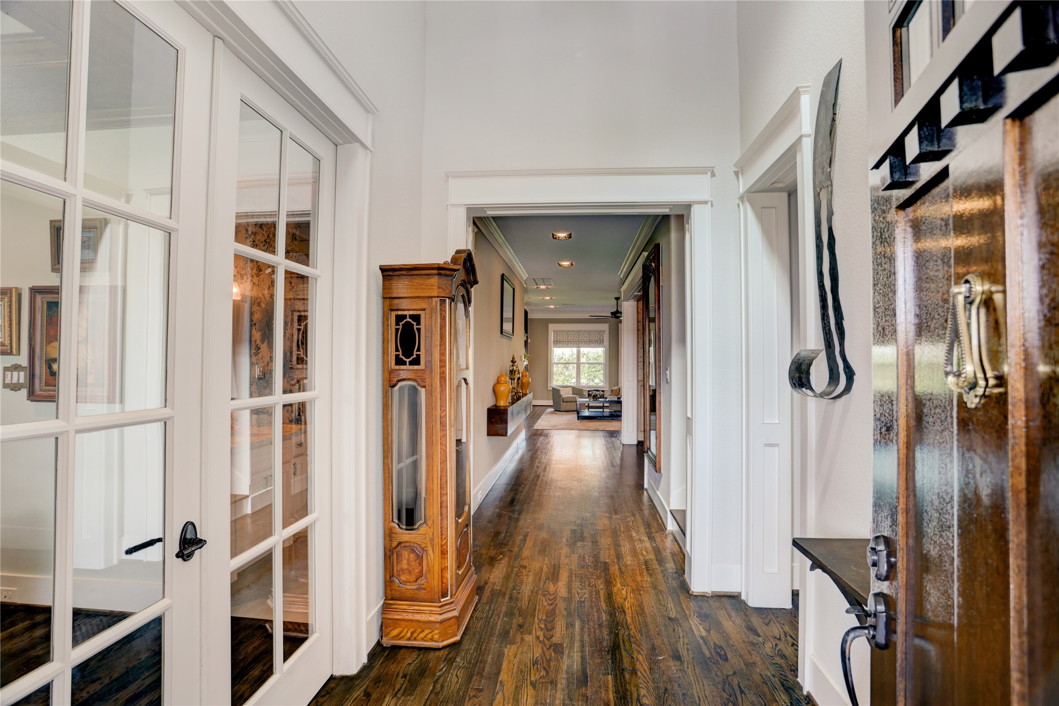 6430 Rolla Street Houston, TX 77055 - Photo 2 of 30 a view of a hallway with wooden floor and staircase