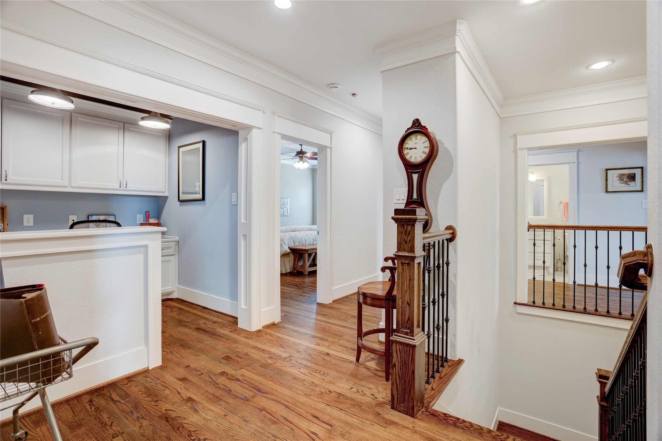 6430 Rolla Street Houston, TX 77055 - Photo 21 of 30 a view of a workspace with furniture and wooden floor
