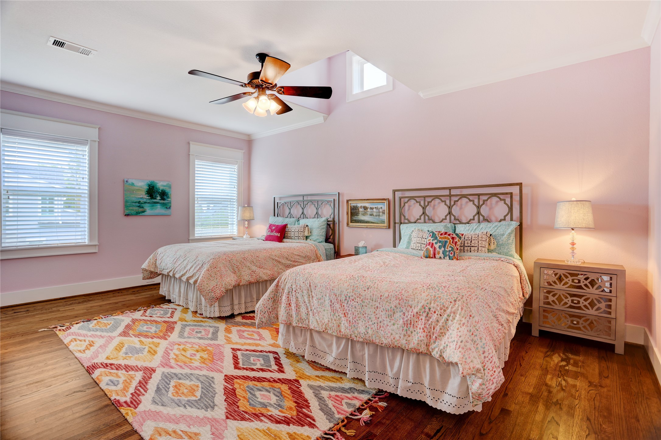 6430 Rolla Street Houston, TX 77055 - Photo 24 of 30 a bedroom with double bed and a window