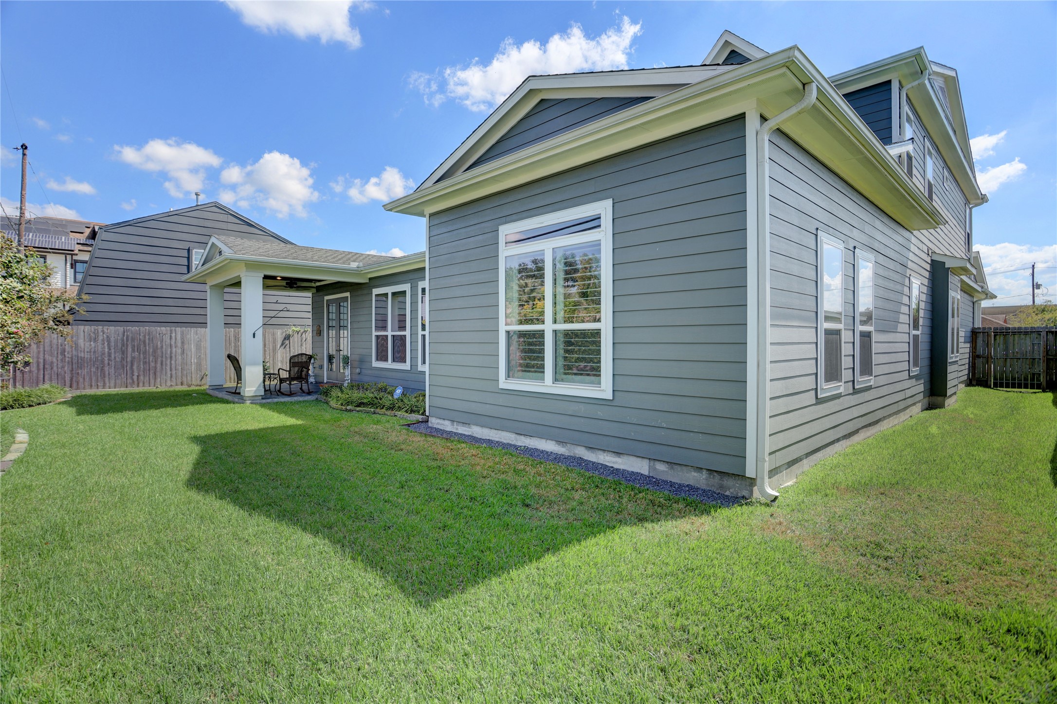 6430 Rolla Street Houston, TX 77055 - Photo 28 of 30 a backyard of a house with table and chairs
