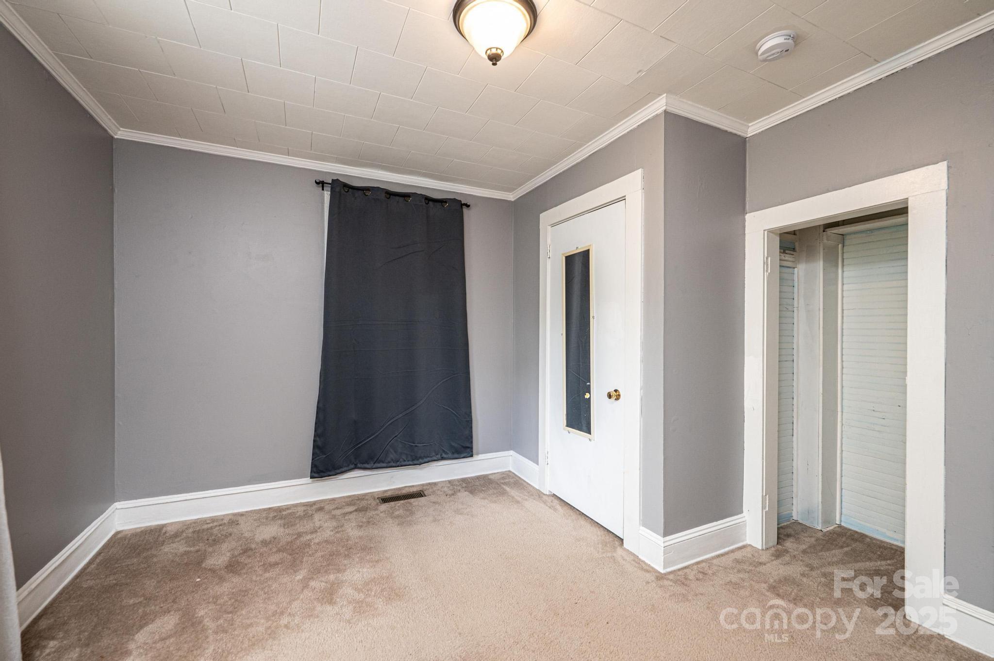504 North Spring Avenue Newton, NC 28658 - Photo 26 of 35 an empty room with closet area