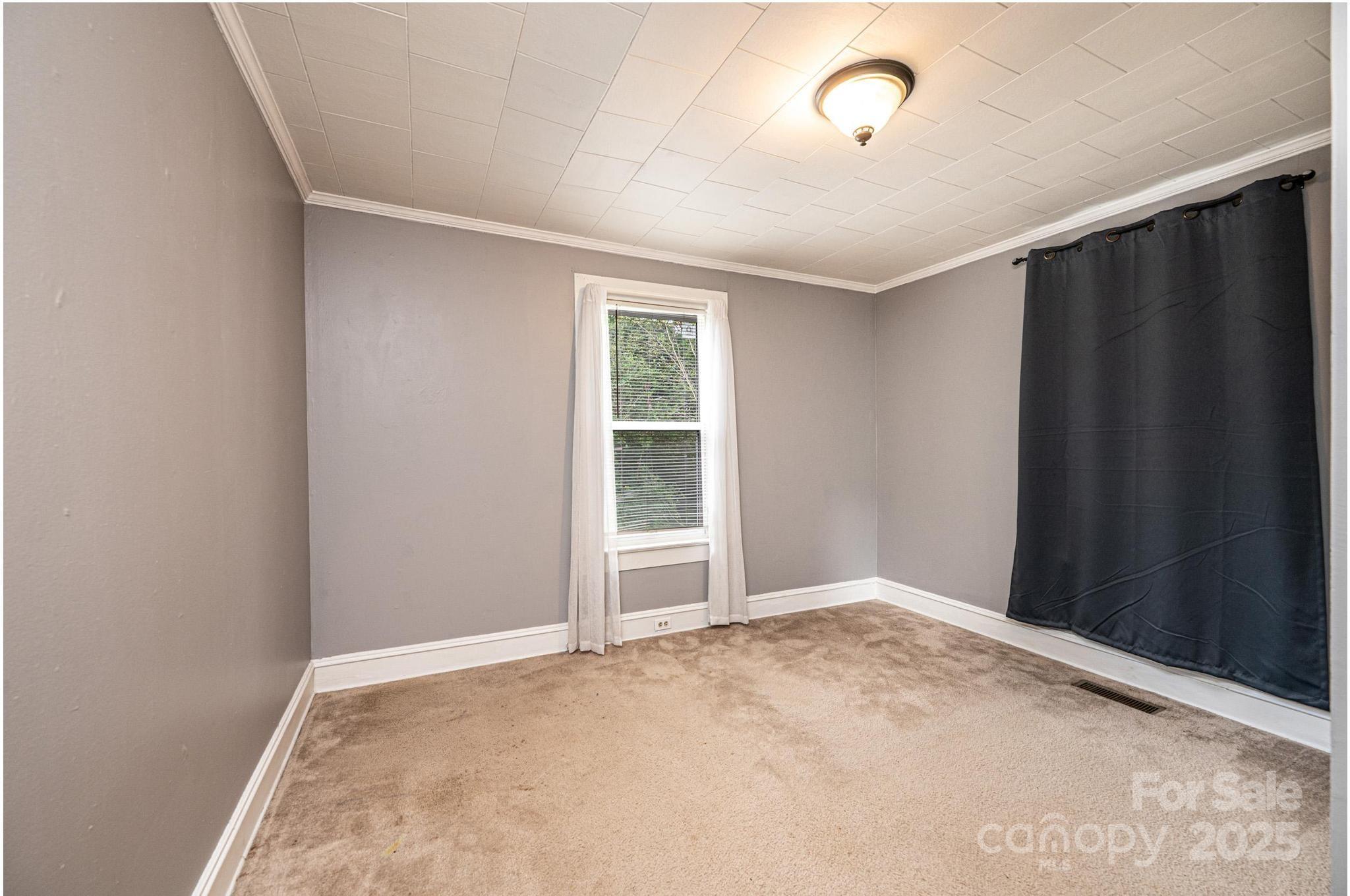 504 North Spring Avenue Newton, NC 28658 - Photo 32 of 35 an empty room with windows