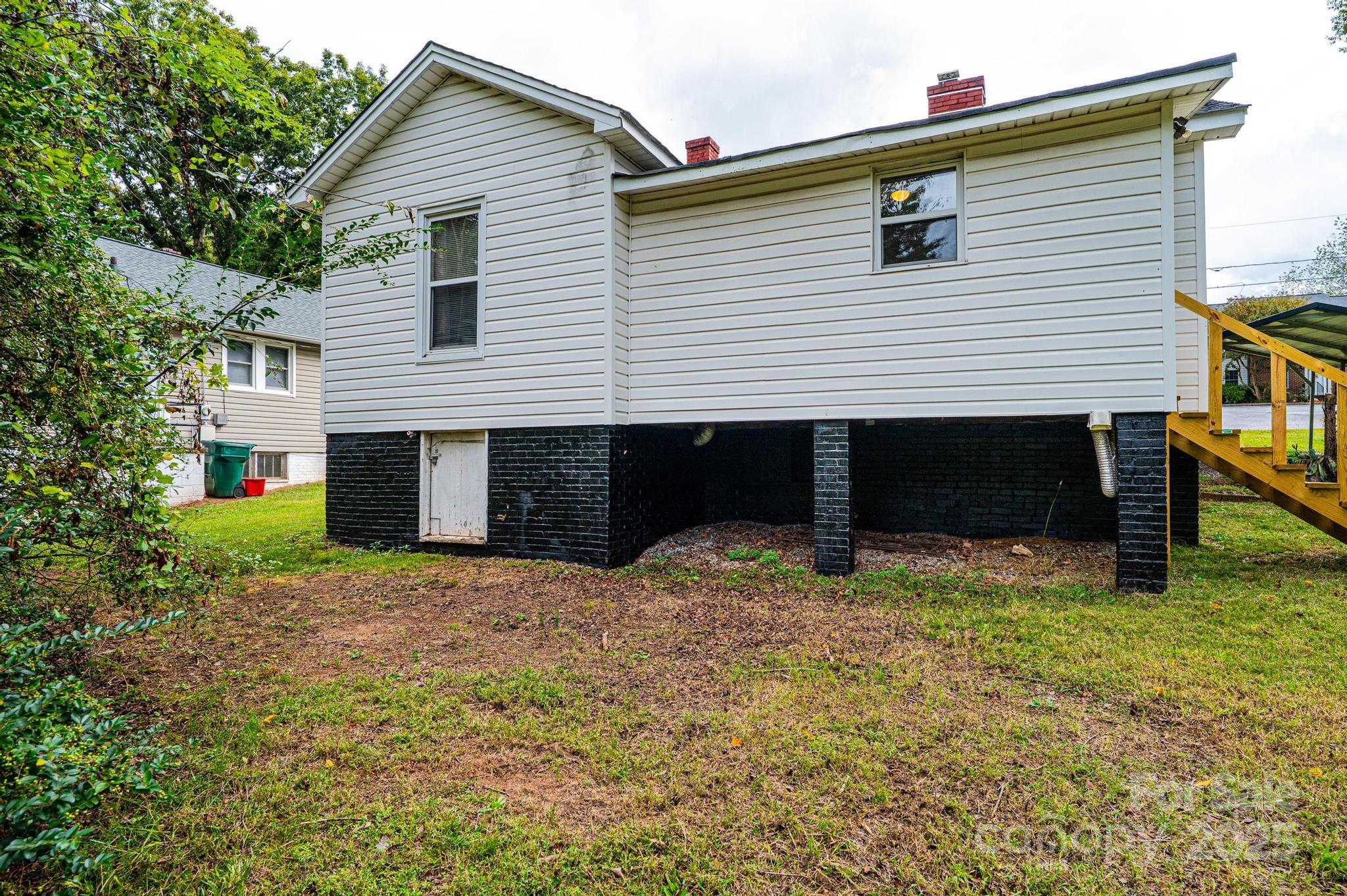 504 North Spring Avenue Newton, NC 28658 - Photo 10 of 35 a view of a house with a yard