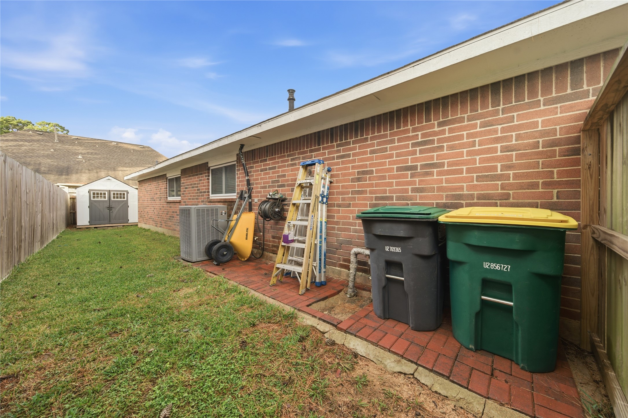 13506 Spring Court Tomball, TX 77375 - Photo 35 of 37 a view of a house with a backyard