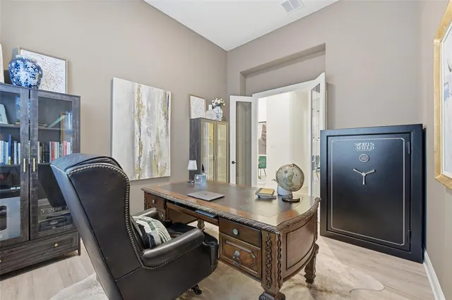 a view of kitchen island with stainless steel appliances