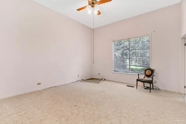 a view of an ocean and a yard