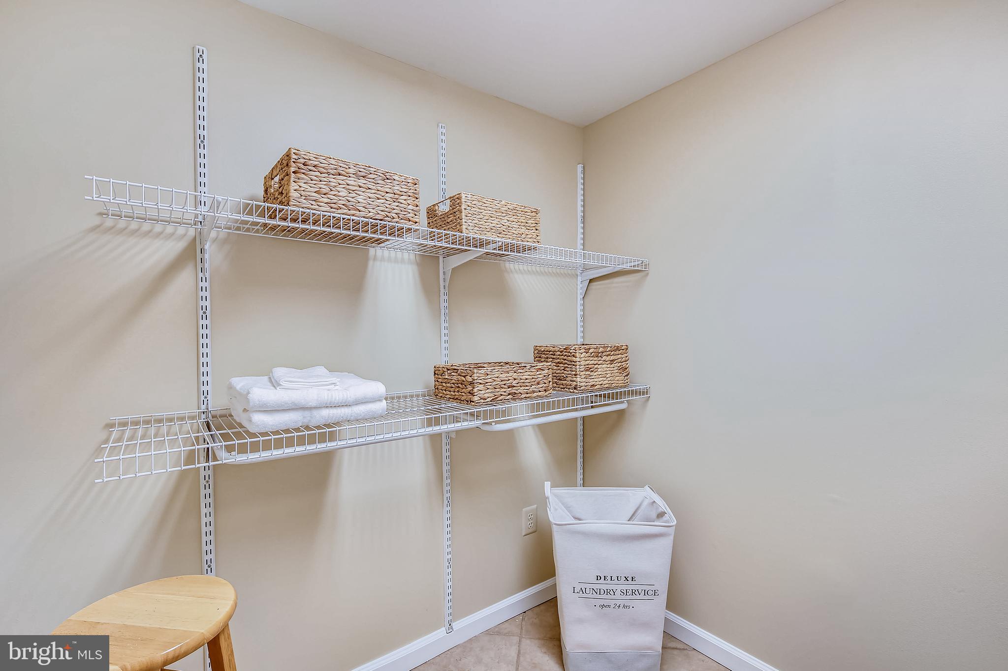 11955 Grey Squirrel Lane Reston, VA 20194 - Photo 33 of 61 Separate laundry room with shelving