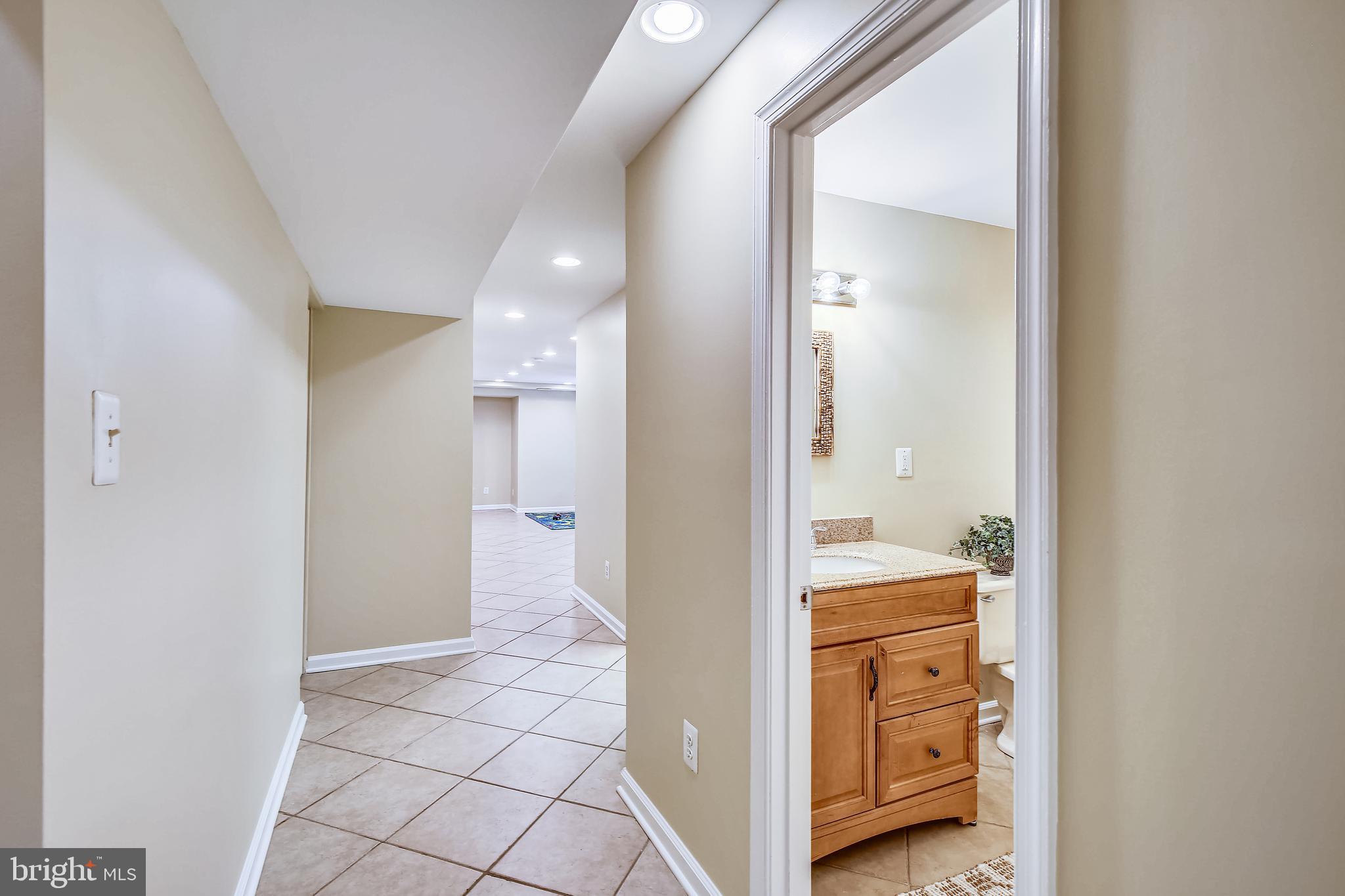 11955 Grey Squirrel Lane Reston, VA 20194 - Photo 35 of 61 Bathroom between 5 the bedroom and Rec room