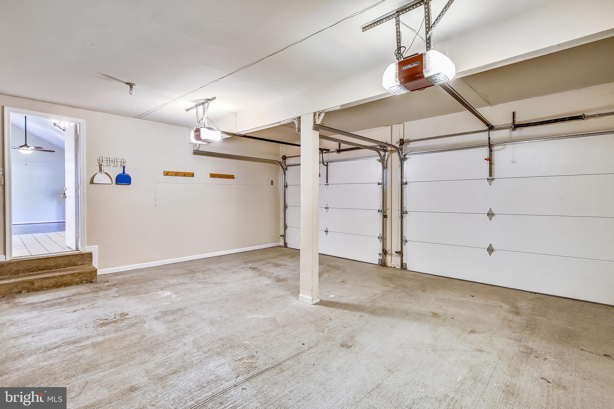 11955 Grey Squirrel Lane Reston, VA 20194 - Photo 39 of 61 Double garage opens to foyer and kitchen area