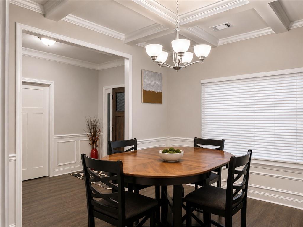 3359 Elkhorn Ridge Run Dacula, GA 30019 - Photo 7 of 35 a view of a dining room with furniture and wooden floor