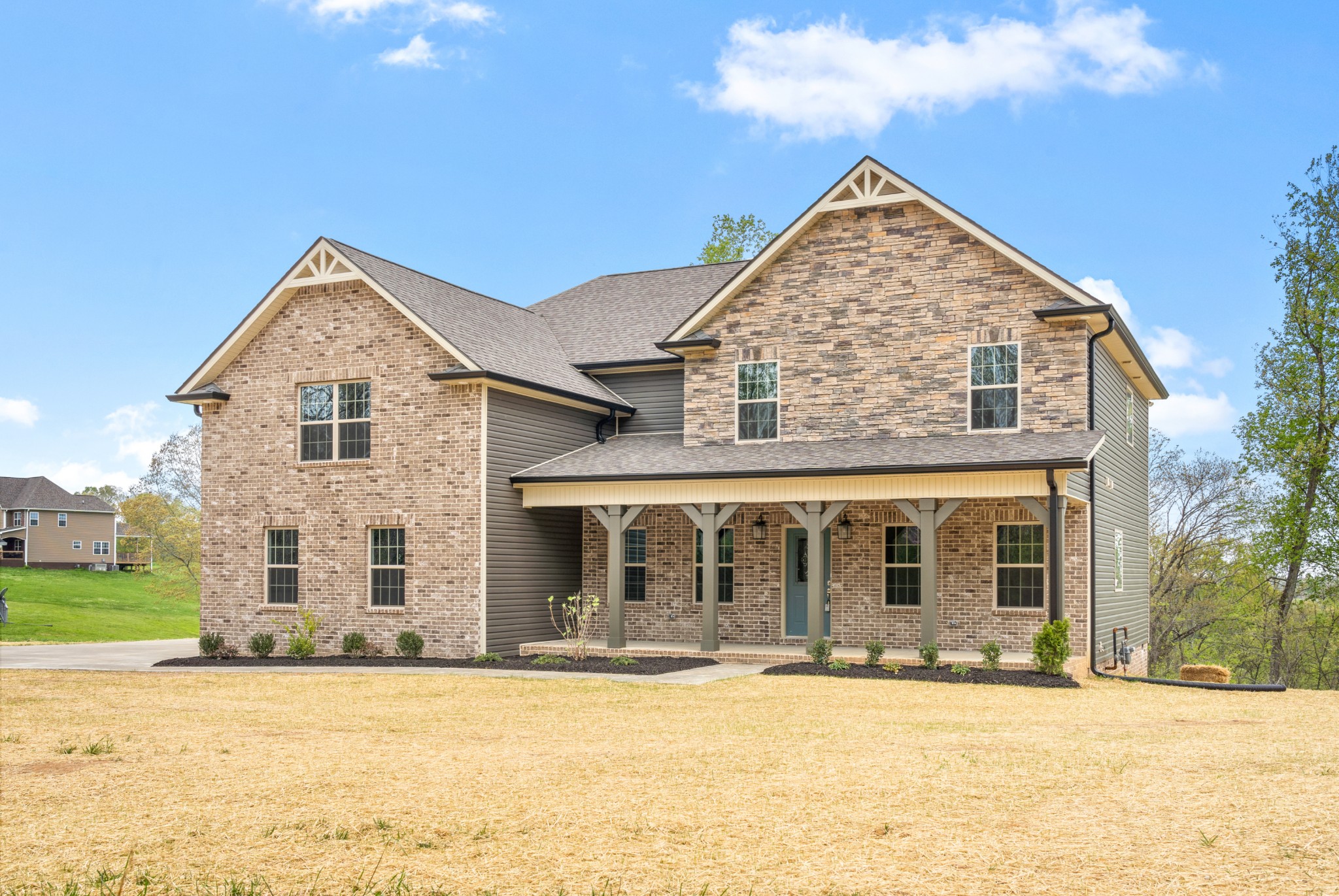 267 Alonzo Place Cunningham, TN 37052 - Photo 1 of 40 front view of a house with a yard