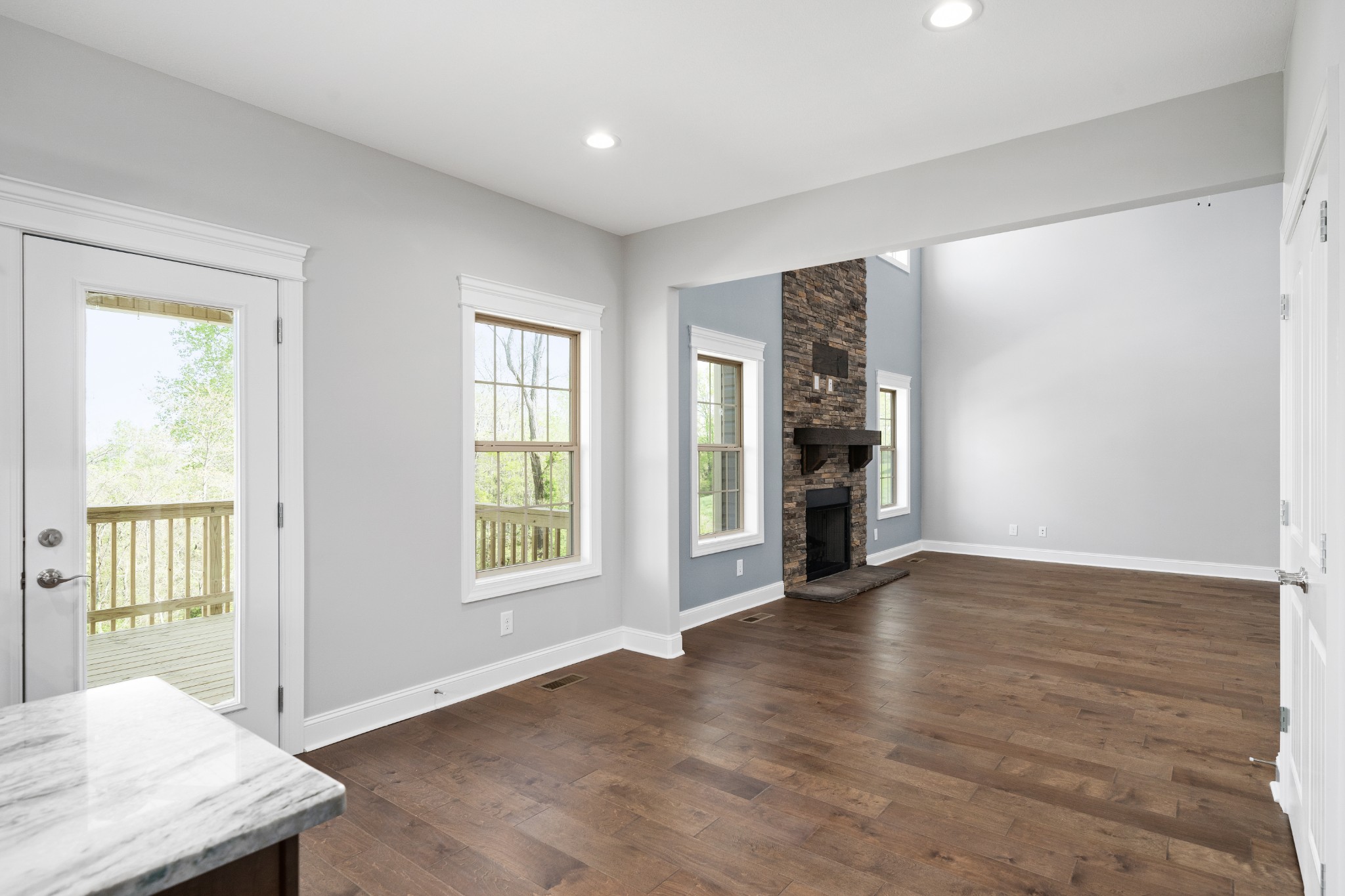 267 Alonzo Place Cunningham, TN 37052 - Photo 11 of 40 a view of an empty room with wooden floor and a window