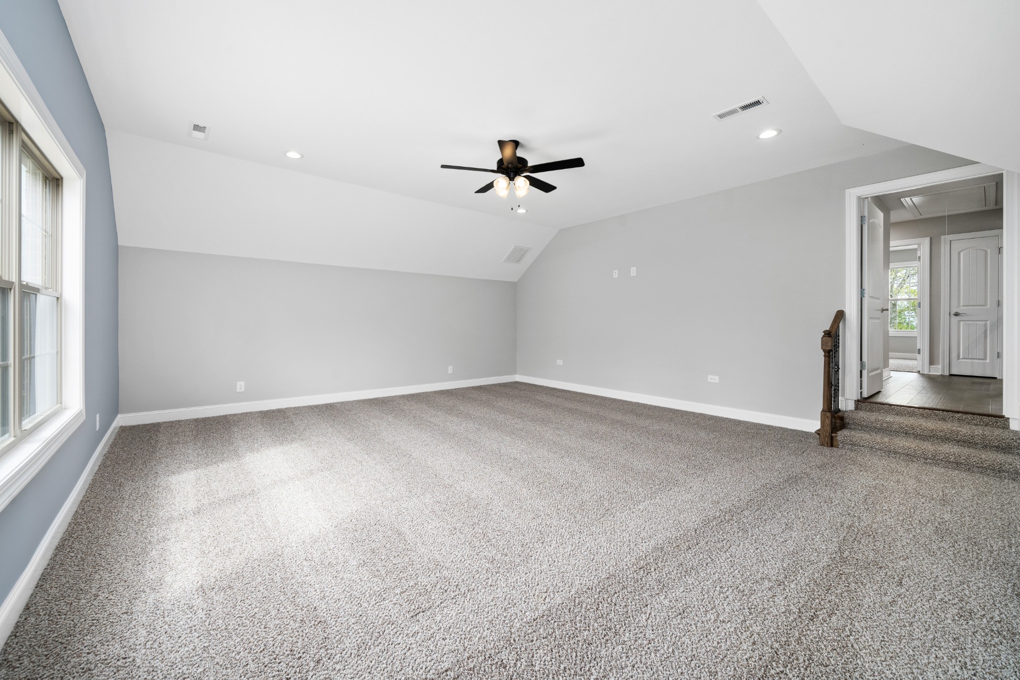 267 Alonzo Place Cunningham, TN 37052 - Photo 37 of 40 an empty room with a ceiling fan and a window